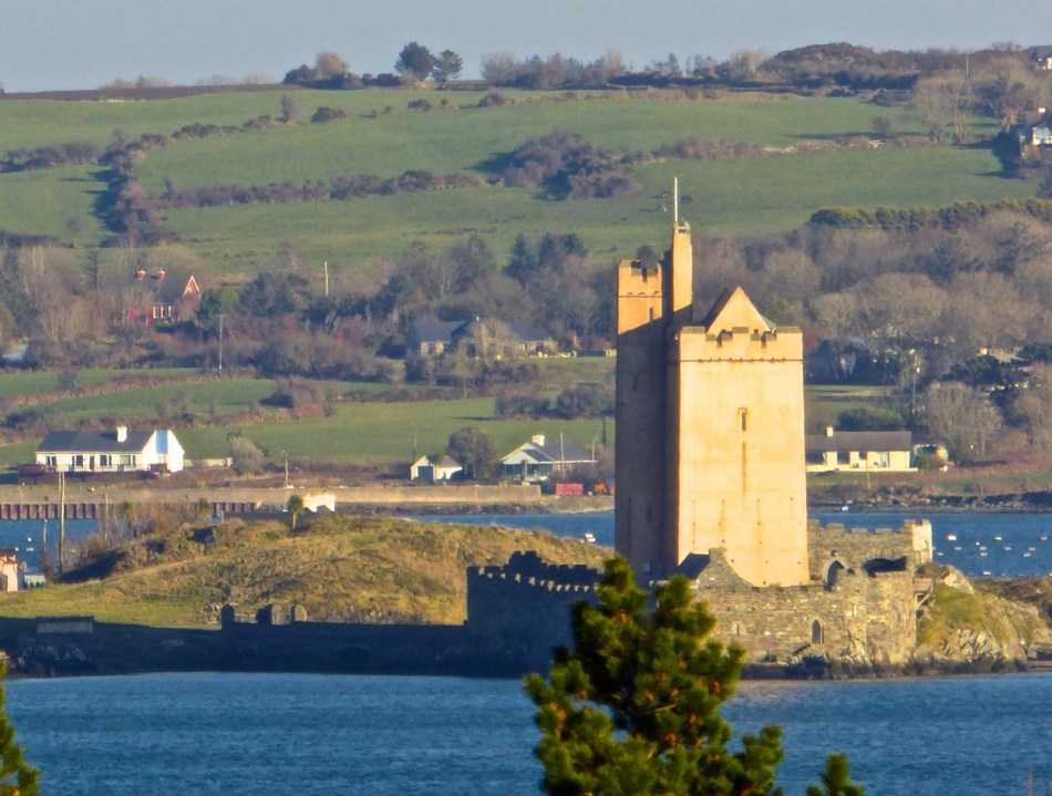 Kilcoe Castle. Note crenellated battlements and pitched roof.
