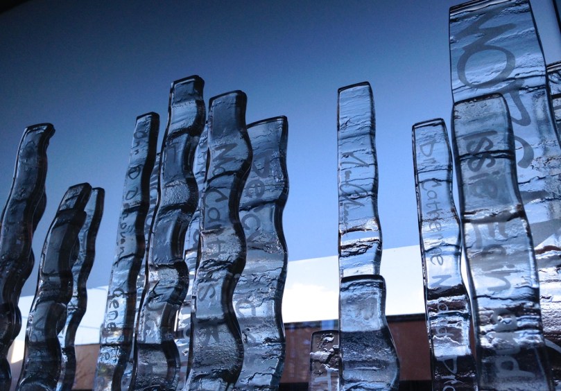 A specially commissioned glass sculpture by Michael Ray graces the entrance hall, and incorporates the names of sponsors of the building