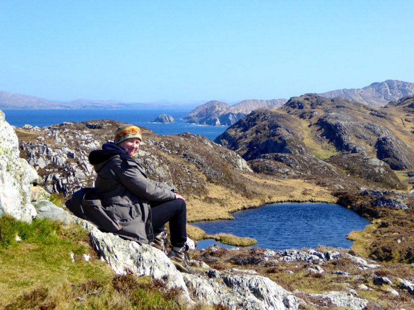 Susan at the cairn. Three Castle Head on the Mizen