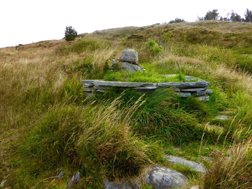 This curious little monument is right beside the parking spot