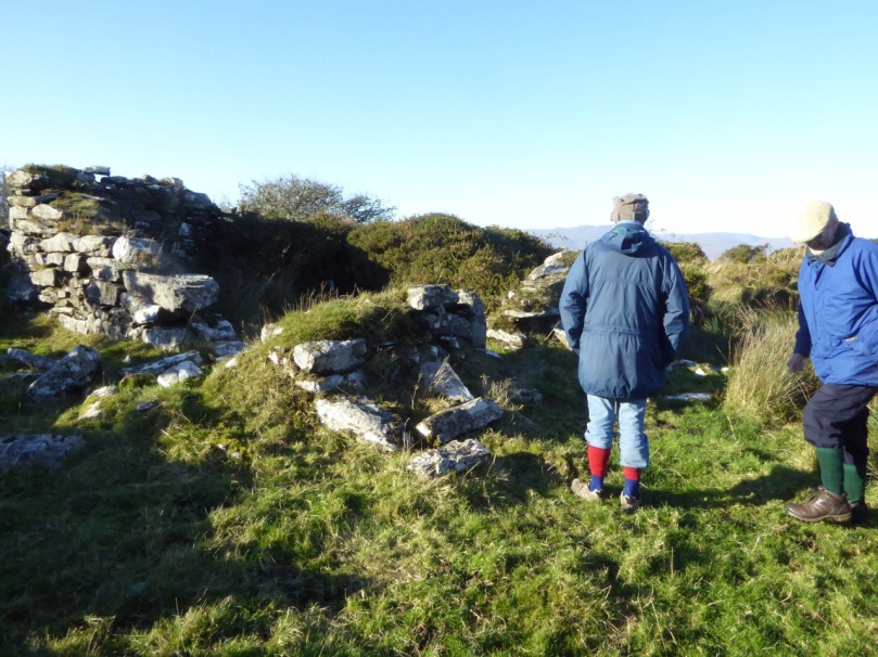 Robert and John inspect the little ruined farmhouse